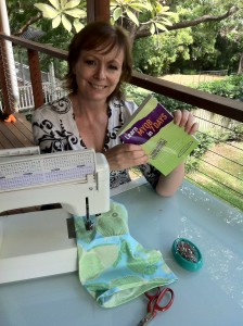 Louise Stuart of iSewAcademy with her copy of Learn MYOB in 7 Days